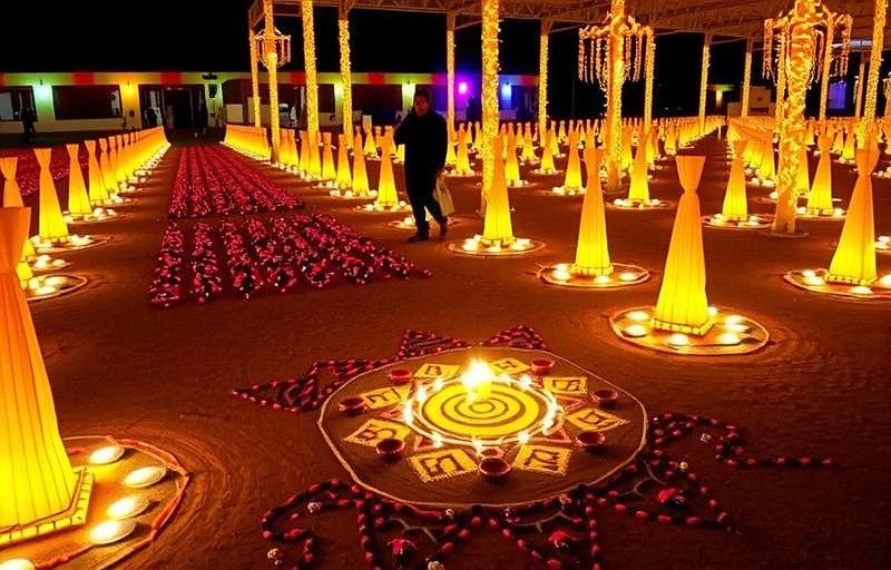 Cumin Power Play Saffron Surge localized events Cumin Power Play Saffron Surge Diwali event showing decorated spice farms with festive lights and rangoli